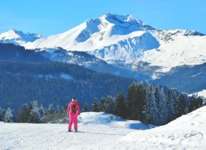 Woman skier enjoying the view of LeEs Gets